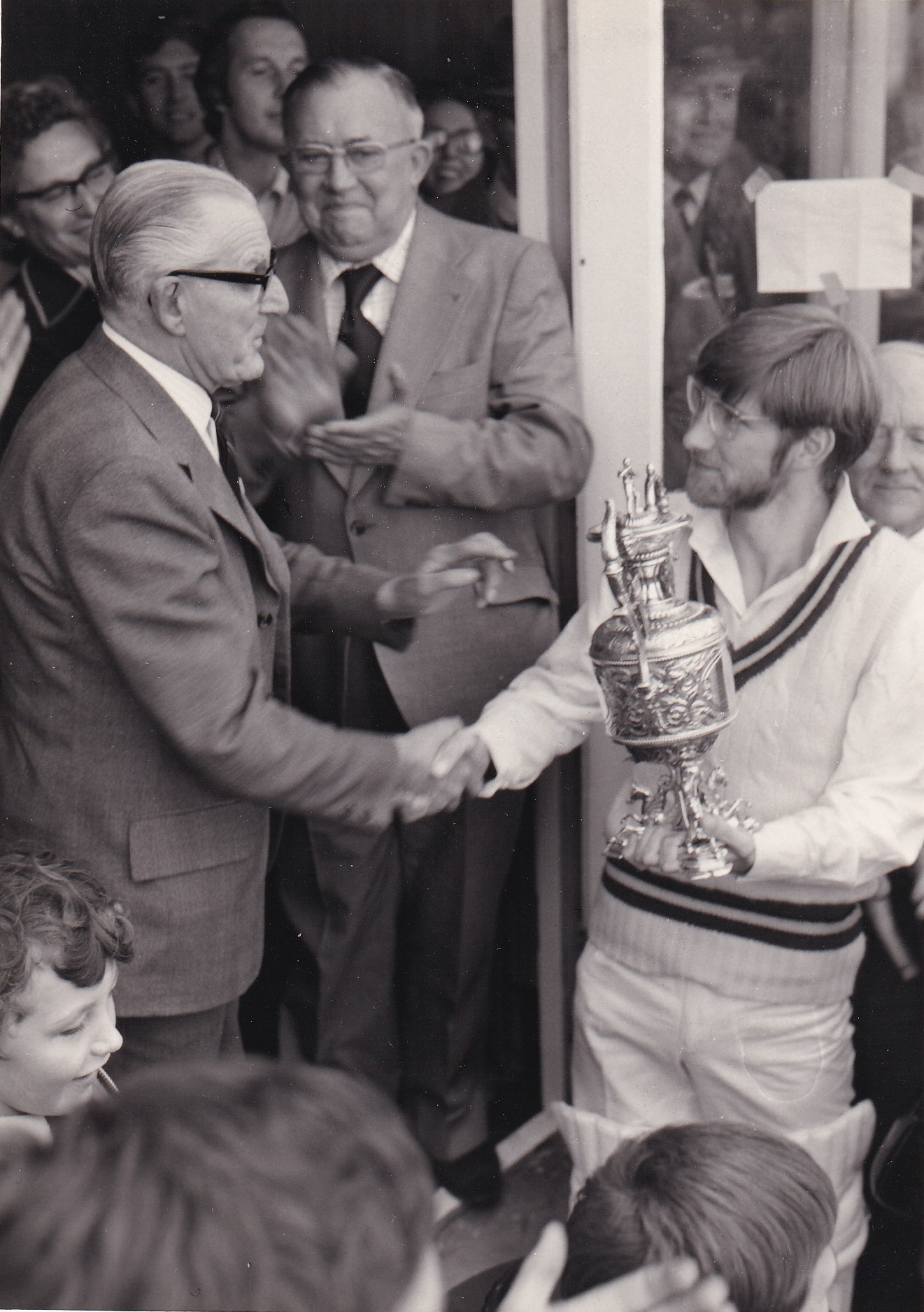 Peter receives the trophy